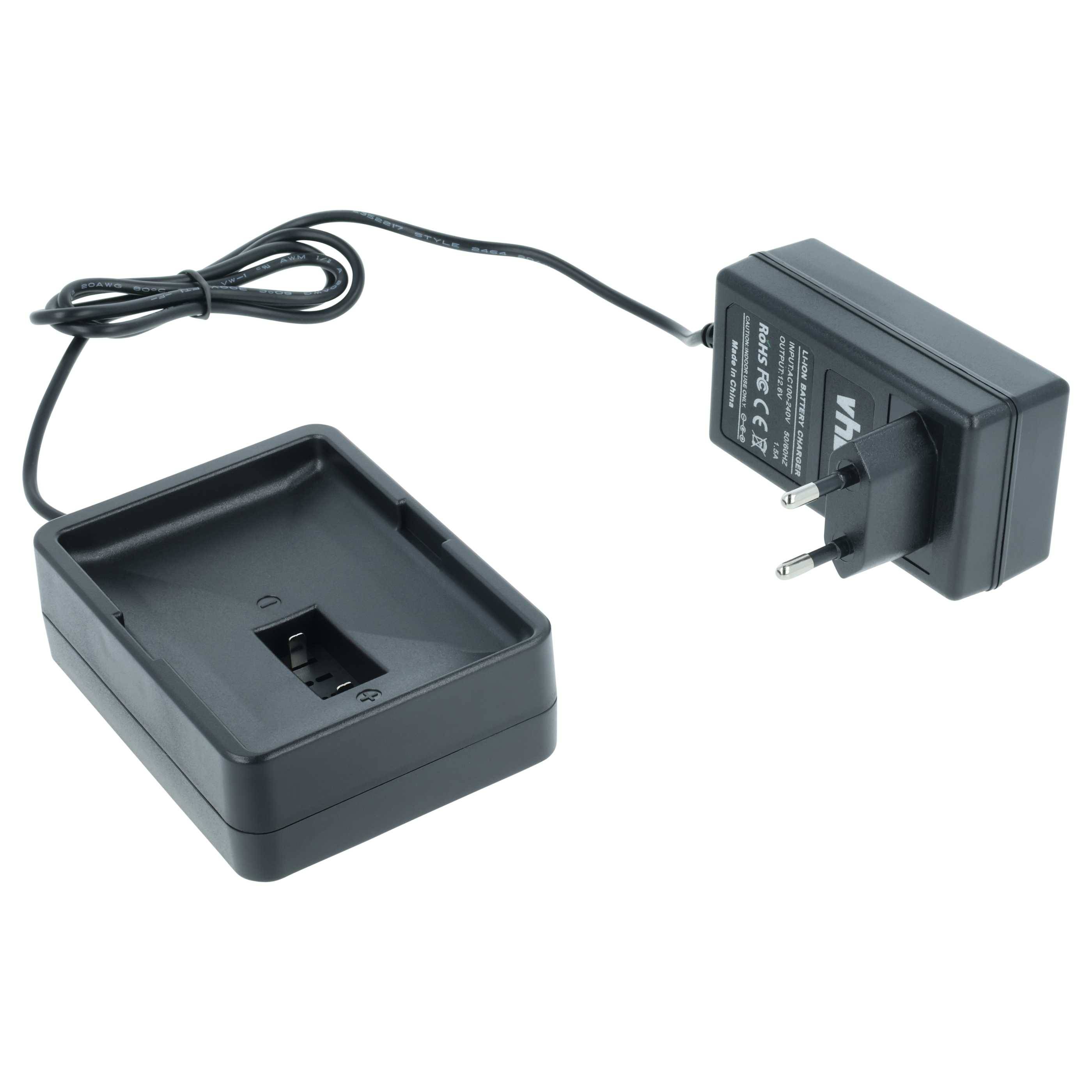 Ein schwarzer elektronischer Adapter mit einem zweipoligen Stecker und einer separaten Dockingstation zum Aufladen elektronischer Geräte.