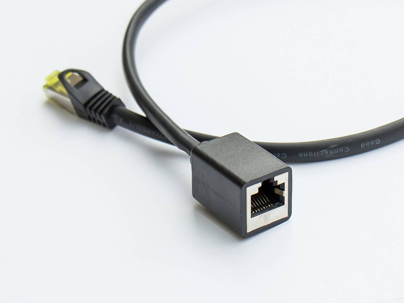 Kabelmeister® RJ45 Patchkabelverlängerung mit Cat. 7 Rohkabel und Rastnasenschutz (RNS®), halogenfrei,schwarz, 5m