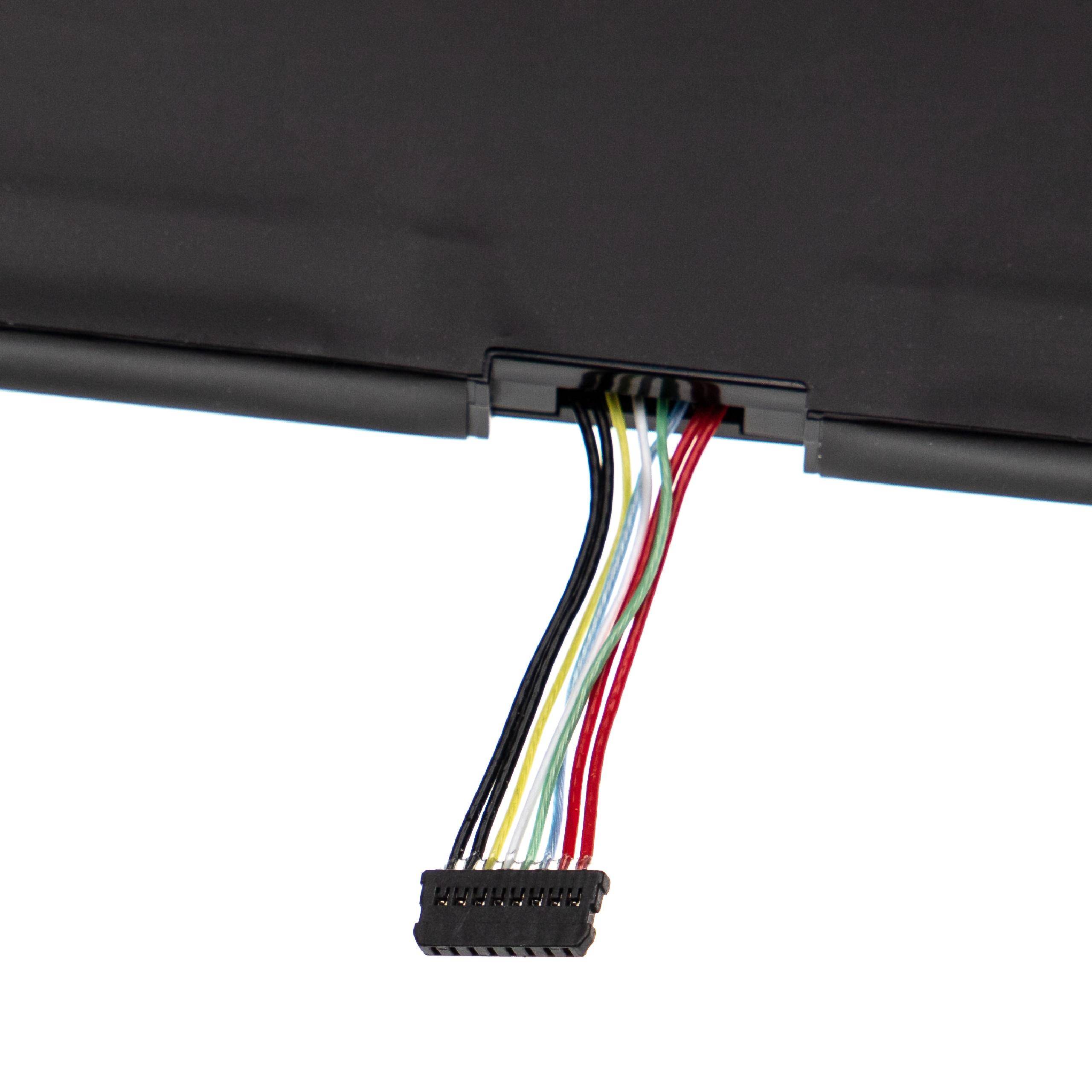 Nahaufnahme eines schwarzen elektronischen Steckverbinders mit mehrfarbigen Drähten, die von einem Gerät oder einer Platte herunterhängen.