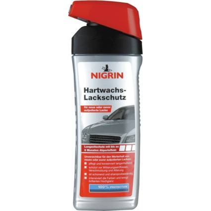 Flasche von NIGRIN 'Hartwachs-Lackschutz' Autopflege-Schutzspray mit roter Kappe und silbernem Etikett.