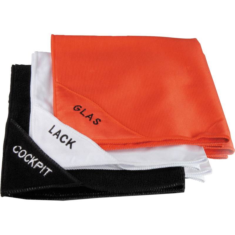 Drei Mikrofasertücher, beschriftet mit 'GLAS' in Orange, 'LACK' in Weiß und 'COCKPIT' in Schwarz, gefaltet und gestapelt.