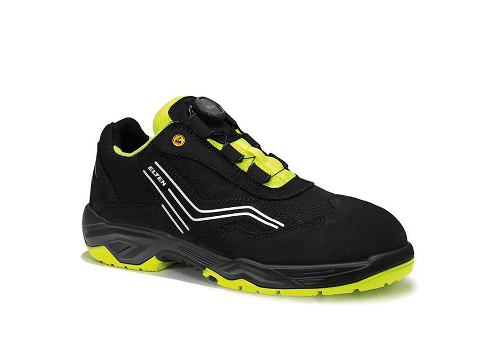 Ein schwarzer und neon-gelber Sportschuh mit modernem Design, ausgestattet mit Schnürverschluss und dicker Sohle.