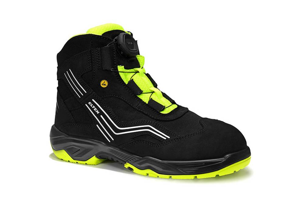 Ein schwarzer und neon-grüner High-Top-Wanderschuh mit Gummisohle und Klettverschluss, entwickelt für Outdoor-Aktivitäten.
