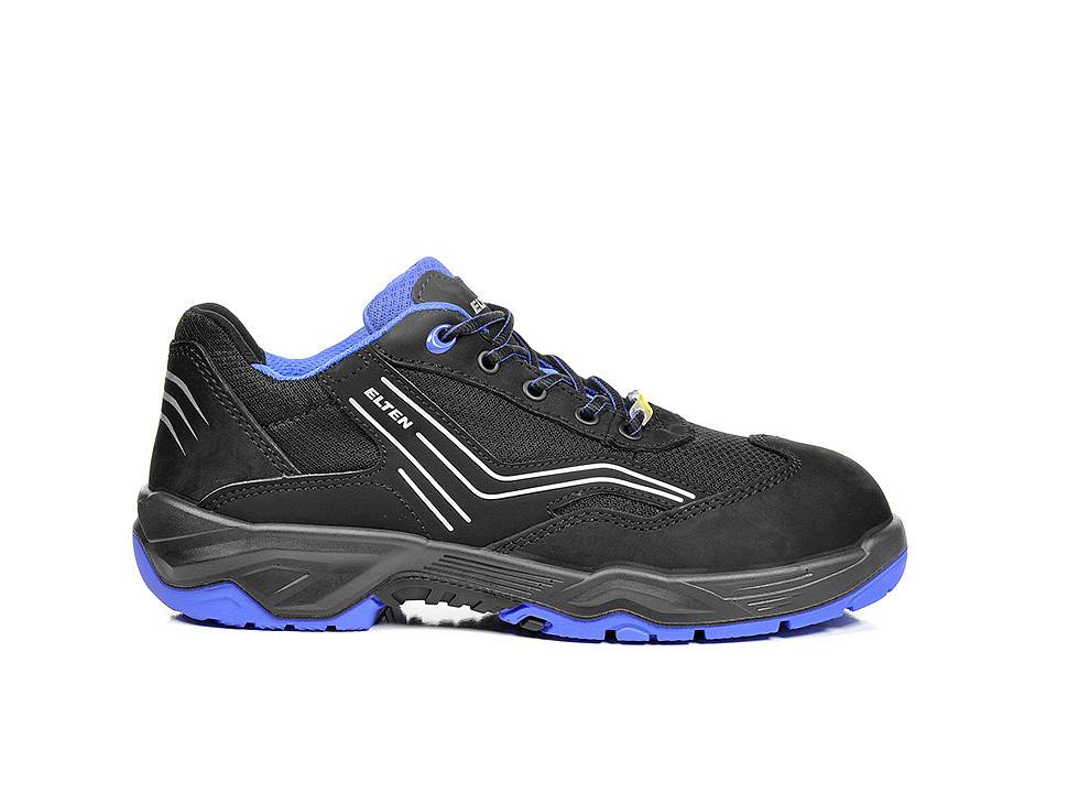 Ein schwarzer und blauer Sportschuh mit einer robusten Sohle und weißer Zickzack-Detaillierung, geeignet für Outdoor-Aktivitäten.