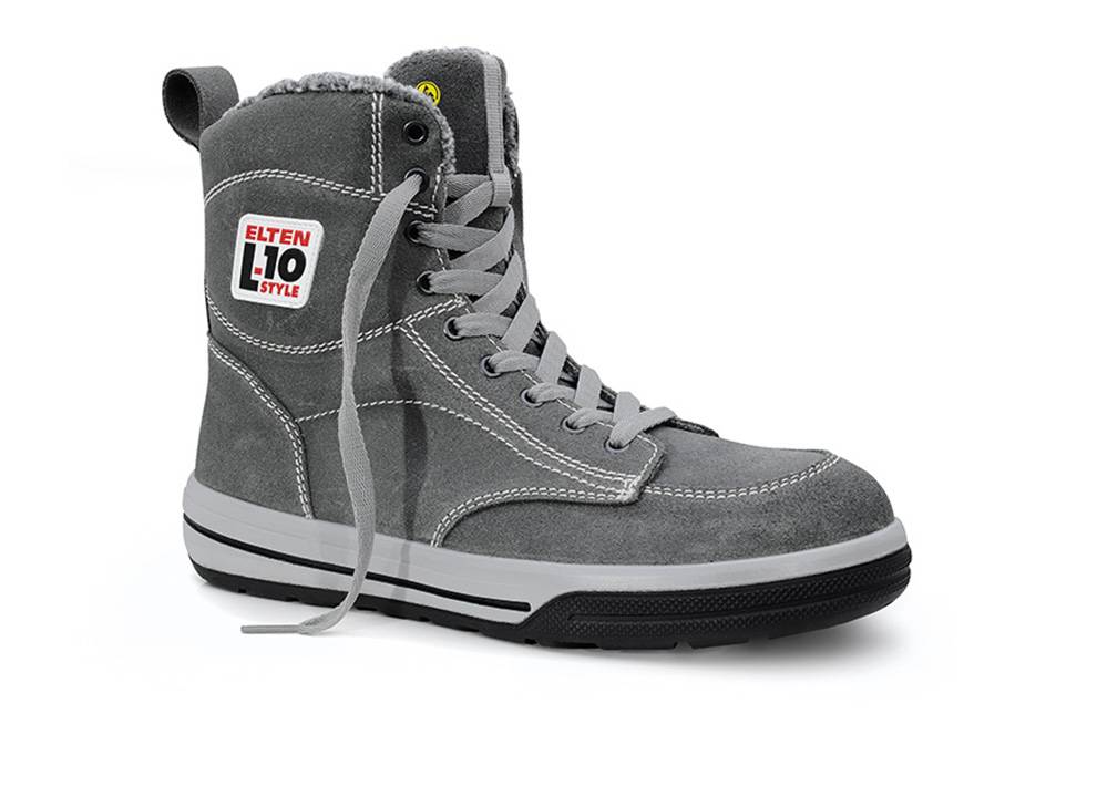 Ein grauer High-Top-Sneaker mit Schnürsenkeln, versehen mit einer 'ELTEN L-10 STYLE' Beschriftung an der Seite, gestaltet mit sichtbaren Nähten und einer schwarzen Sohle.