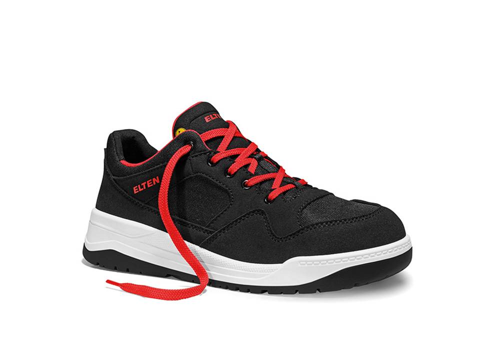 Ein schwarzer Sneaker mit roten Schnürsenkeln und dem Wort 'Elten' an der Seite. Der Schuh hat eine weiße Sohle und kontrastierende Texturen am Obermaterial.