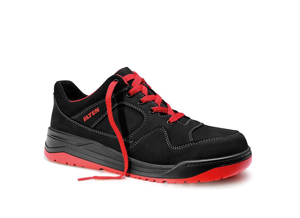 Ein schwarzer Sneaker mit roten Schnürsenkeln und Sohle, mit Kontrastnaht und der Markenaufschrift 'Elten' an der Seite, konzipiert für lässige Freizeitkleidung.