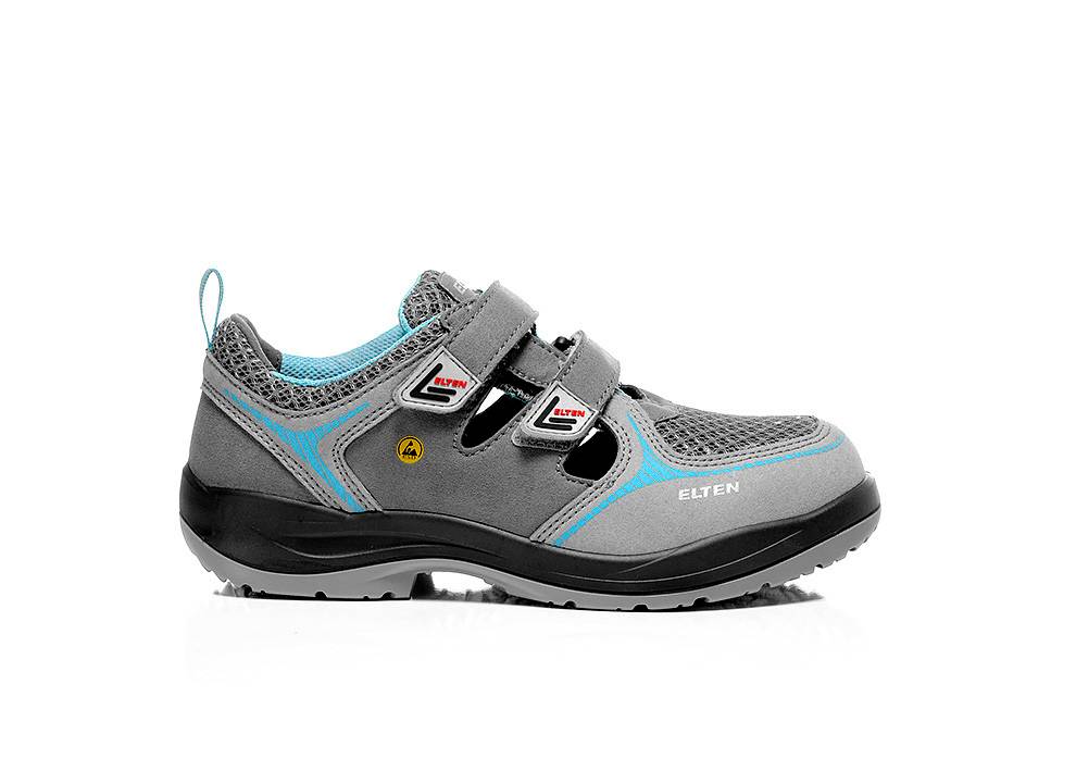 Ein einzelner grau-blauer Sicherheitsschuh mit schwarzer Sohle, ausgestattet mit zwei Klettverschlüssen zum Schließen. Der Schuh wird auf einem weißen Hintergrund präsentiert.
