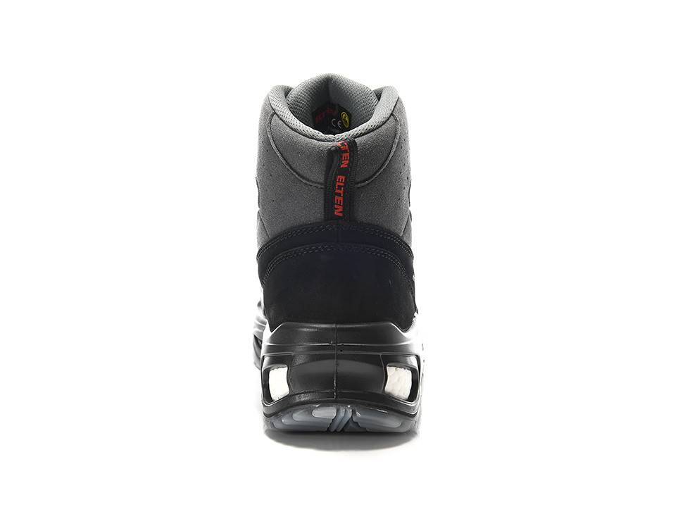 Ein grau-schwarzer High-Top-Turnschuh, von hinten gesehen, mit einem roten Etikett auf der Ferse, auf dem der Text 
