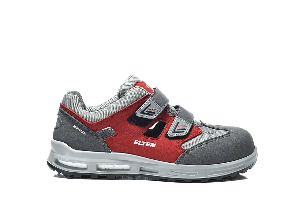 Roter und grauer Sneaker mit Klettverschluss und verstärkter Zehenpartie, entwickelt für Sicherheit und Komfort.