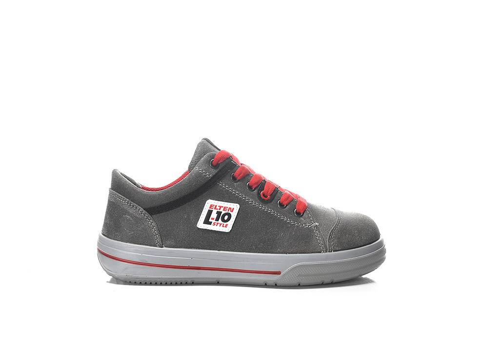 Ein grauer Turnschuh mit roten Schnürsenkeln und einem Etikett an der Seite, auf dem "ELTEN L10 Style"" steht. Der Schuh hat ein lässiges Design mit einer dicken Sohle.