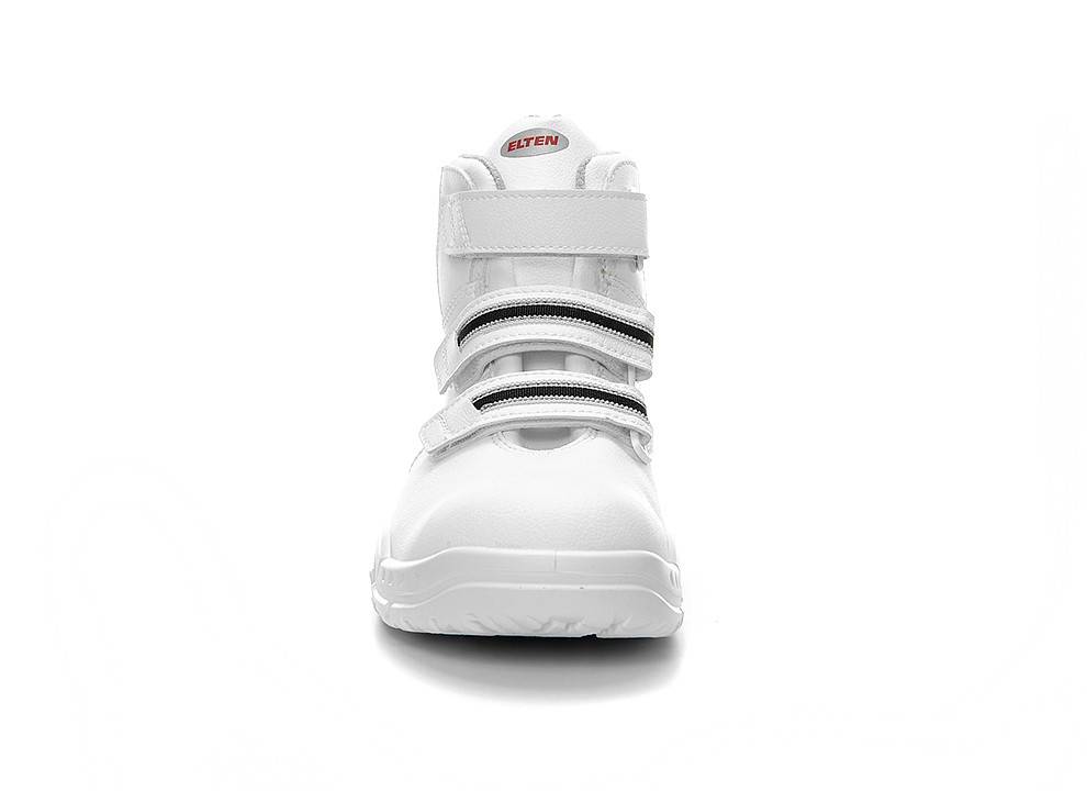 Ein weißer High-Top-Turnschuh mit zwei schwarzgestreiften Klettverschlüssen, auf dessen Zunge der Markenname 'Elten' zu sehen ist, von vorne betrachtet.