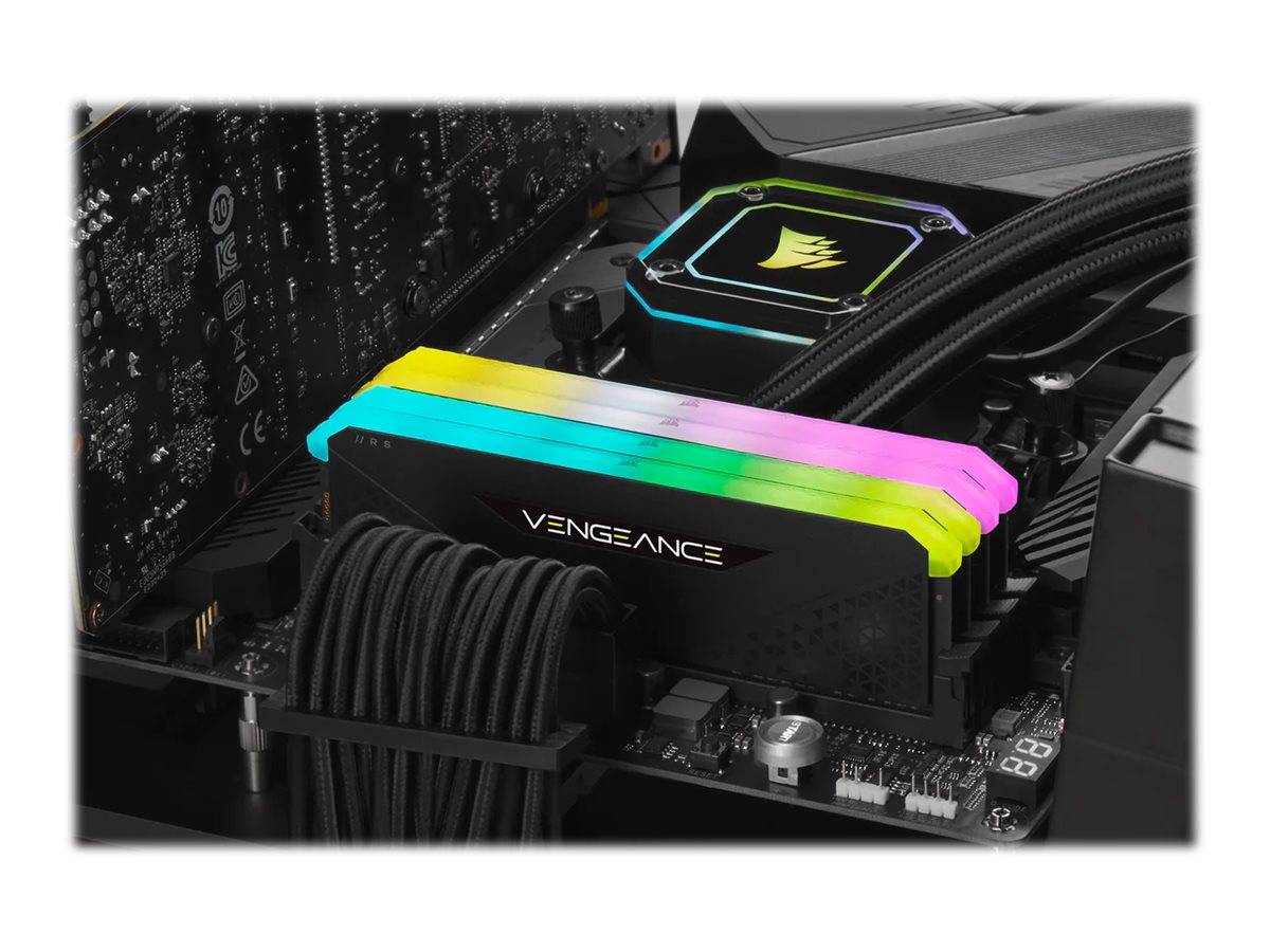 Nahaufnahme einer Desktop-PC-Mainboard mit Corsair Vengeance RAM mit regenbogenfarbiger RGB-Beleuchtung und schwarzer Kabelführung.