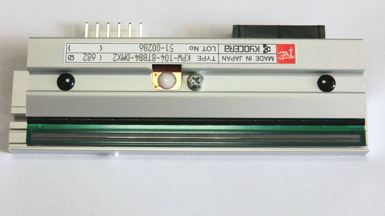 Ein rechteckiges elektronisches Etikettendrucker-Modul von oben fotografiert, mit Stecker-Kontakten, Montagelöchern und einem gedruckten Etikett mit der Aufschrift „HOKOSHA