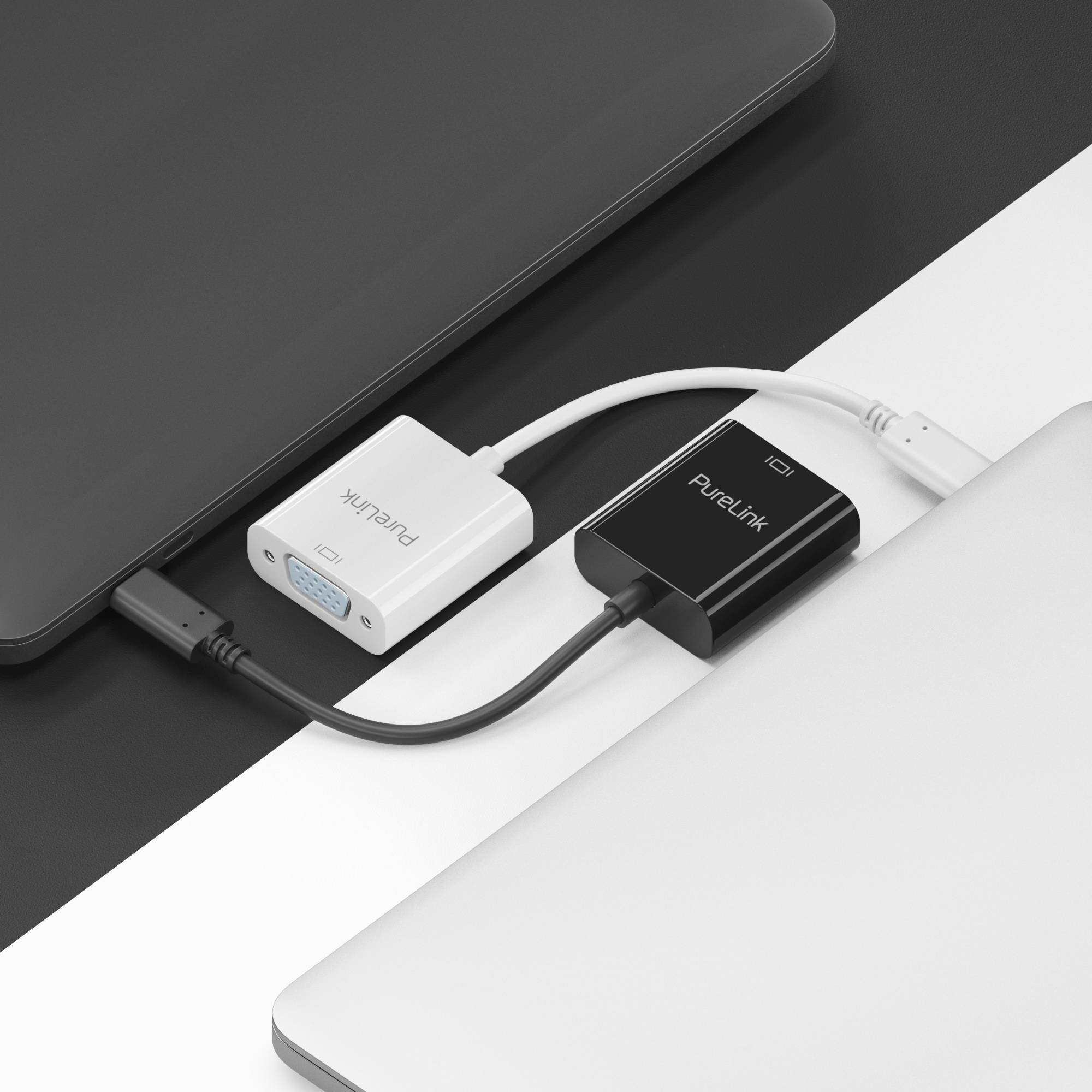 Zwei kleine Adapter-Dongles mit den Bezeichnungen „PureLink