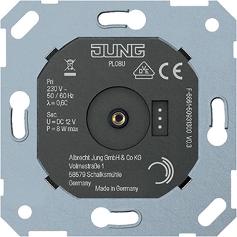 Ein quadratisches elektrisches Gerät mit einem zentralen, kreisförmigen Drehknopf, ausgelegt für 230V, mit mehreren Zertifizierungslogos und Firmendetails am unteren Rand.