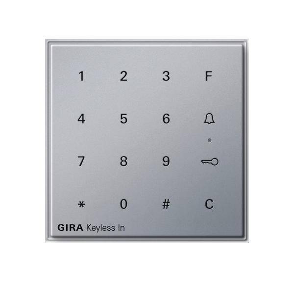 Tastatur für Zugangssystem mit Zahlen 0-9, Buchstaben F und C, Glocken- und Schlüsselsymbolen. Am unteren Rand ist 'GIRA Keyless In' beschriftet.