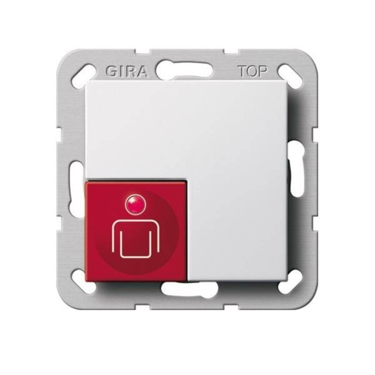 Eine quadratische Metall-Schalterplatte mit der Aufschrift 'GIRA TOP', versehen mit einem weißen und roten Druckknopf, der eine minimalistisch gestaltete Figur mit einem Punkt darüber zeigt.