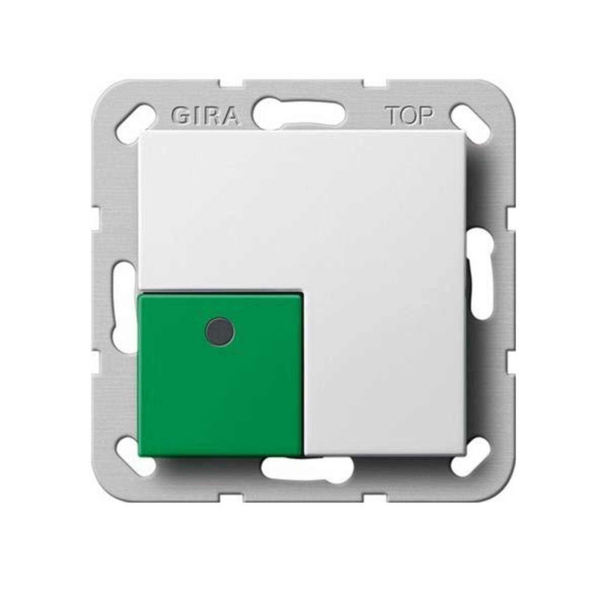 Eine quadratische weiße elektrische Schalterplatte mit einem kleinen grünen Knopf, der in der unteren linken Ecke positioniert ist. Darüber ist das Wort 'TOP' eingraviert.