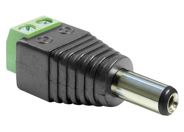 Ein Nahaufnahme eines schwarzen Audiadapters mit zwei grünen Klemmleistenverbindern und einem Metallstecker.