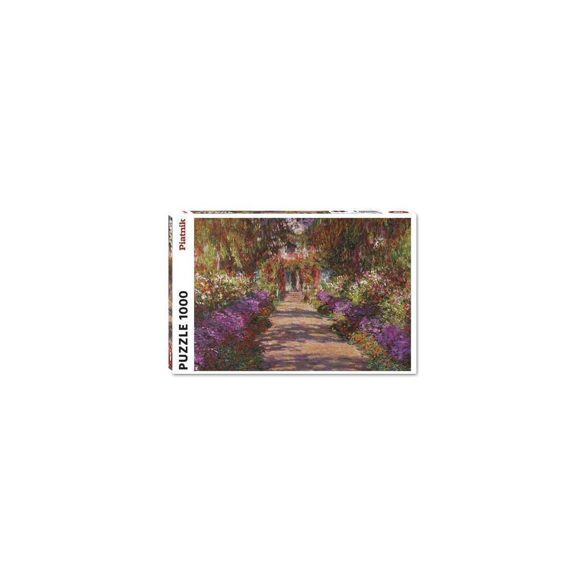 Schachtel eines 1000-teiligen Puzzles, das einen von Blumen gesäumten Gartenweg zeigt, der zu einem Gebäude führt.