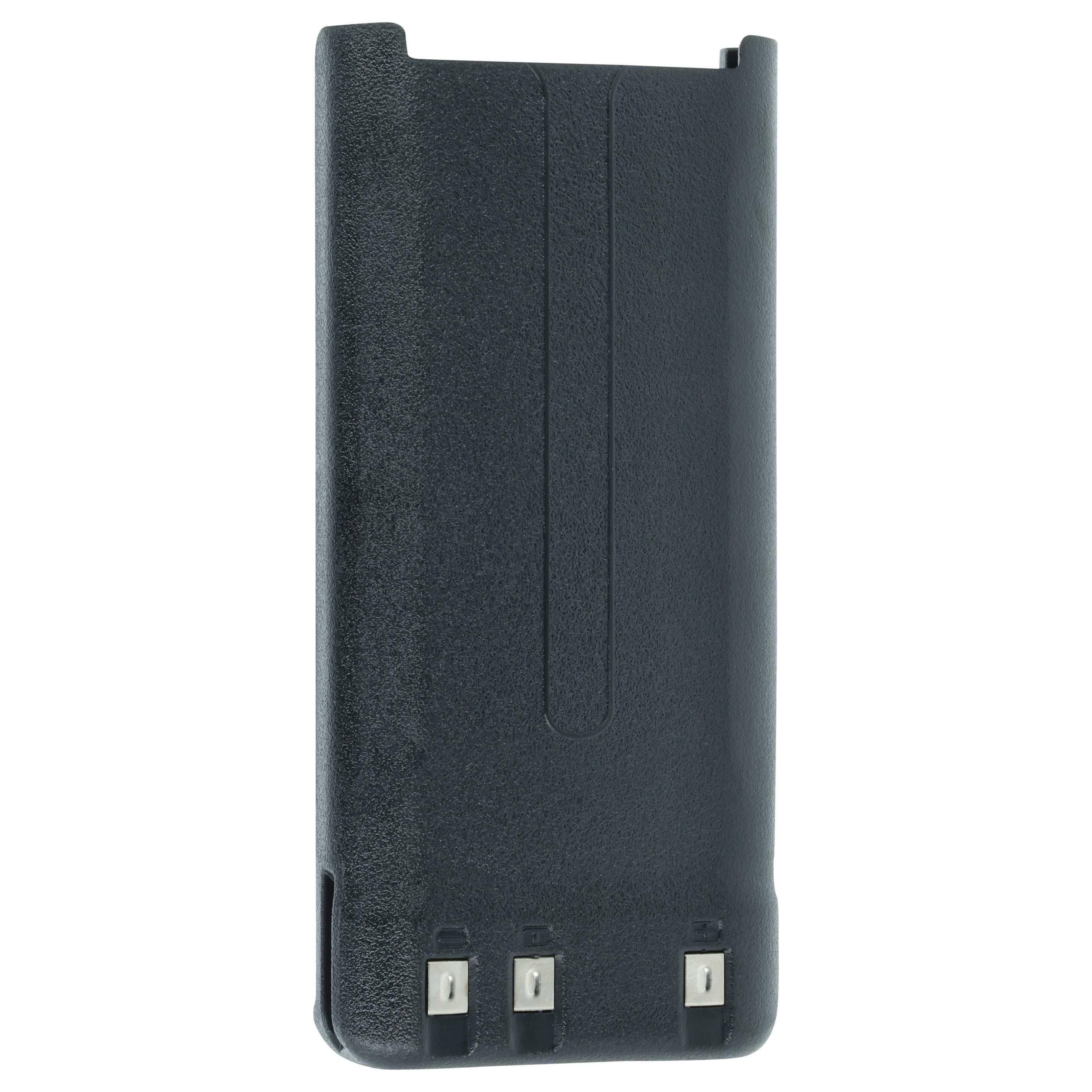 Eine schwarze rechteckige Batterie mit drei Metallkontakten am Boden, entwickelt für tragbare Radios oder ähnliche elektronische Geräte.