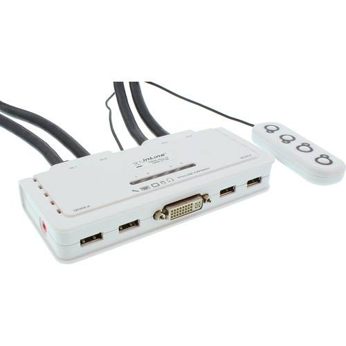 Ein weißer Multiport-KVM-Schalter mit mehreren Eingängen, einschließlich USB und DVI, und einer daneben liegenden Fernbedienung, die zum Umschalten von Geräten verwendet wird.