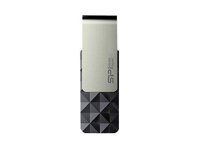 Ein kompakter silberner und schwarzer USB-Stick mit strukturierter geometrischer Unterseite und 