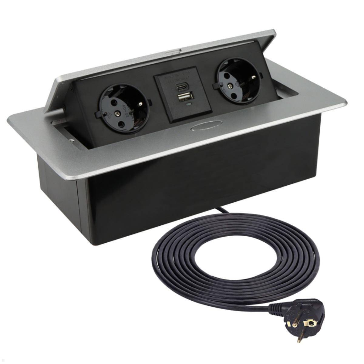 Einbausteckdose mit ausfahrbarem Mechanismus, ausgestattet mit zwei europäischen Steckdosen und doppelten USB-Anschlüssen, die über ein langes Netzkabel verbunden ist.