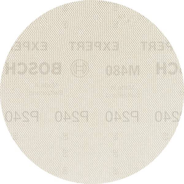 Eine kreisförmige beige Schleifscheibe mit blassen Markierungen, die zum Glätten von Oberflächen in der Holz- oder Metallverarbeitung verwendet wird.