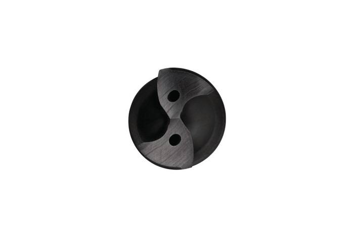Ein runder schwarzer Gegenstand mit zwei kreisförmigen Löchern und geschwungenen Vertiefungen, der einem künstlerischen Yin-Yang-Design ähnelt.