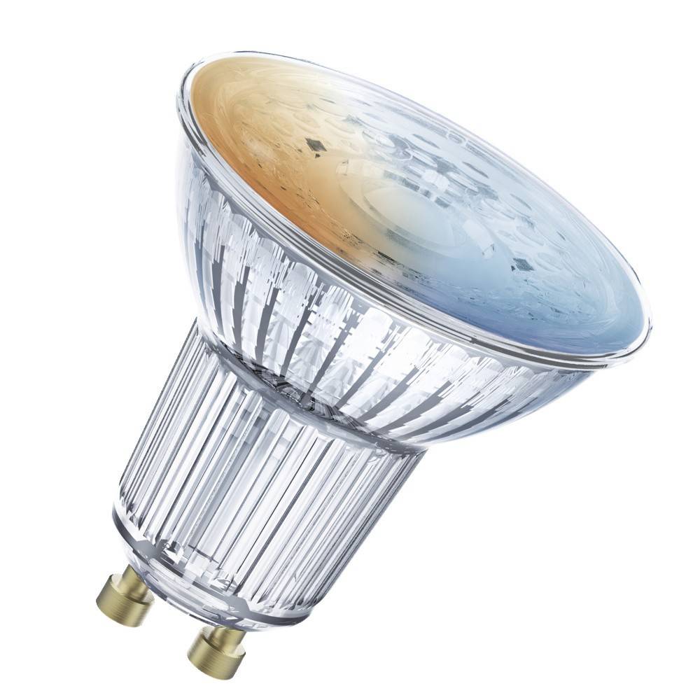 Eine Halogen-Scheinwerferlampe mit einem transparenten, gerippten Körper und einer reflektierenden Oberfläche, die in Beleuchtungskörpern für fokussierte Beleuchtung verwendet wird.