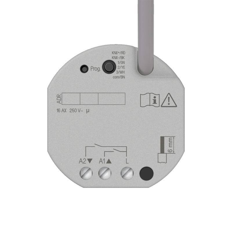 Nahaufnahme eines grauen elektrischen Relais/Moduls mit angeschlossenem Draht, beschriftet mit „Prog