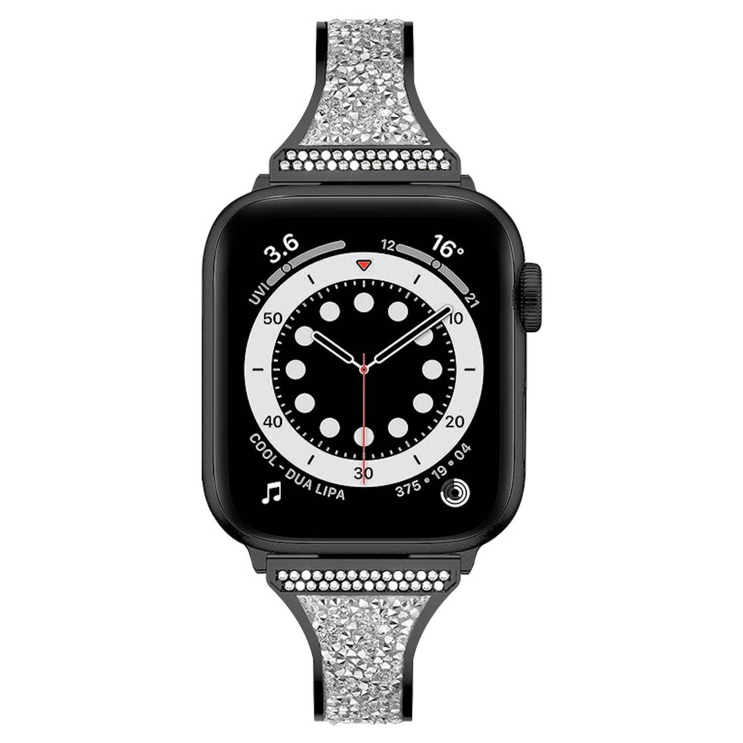 Schwarze Smartwatch mit verziertem Silberarmband, zeigt ein analog gestaltetes Zifferblatt mit dem Text „DUA LIPA