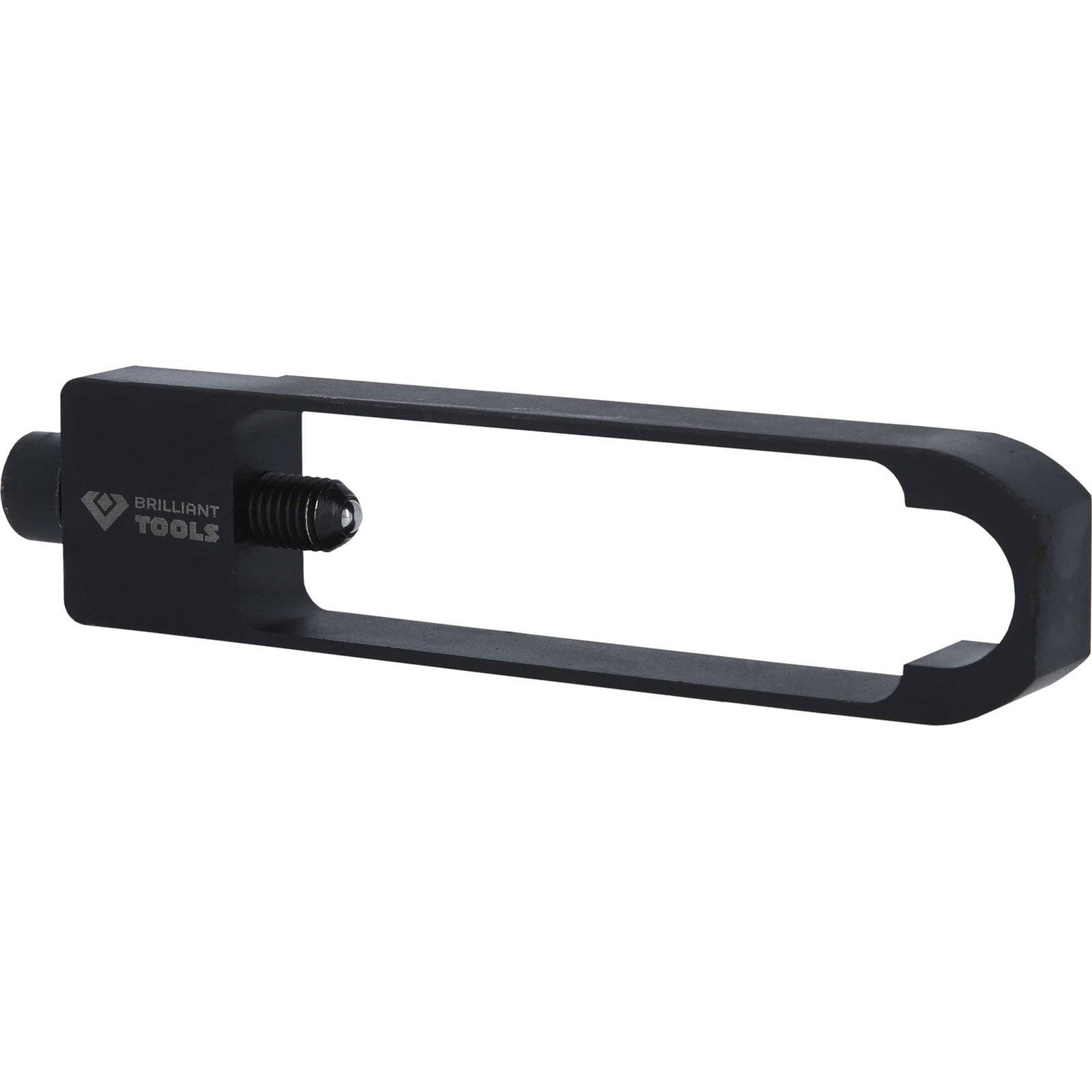 Eine schwarze Metallhalterung mit einer rechteckigen Öffnung, die an einer Seite eine Schraube aufweist. Die Marke 'Brilliant Tools' ist eingeprägt.