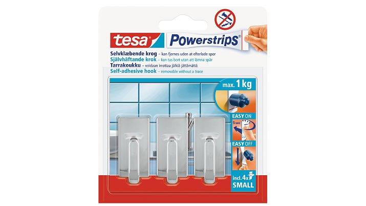 Verpackung für tesa Powerstrips selbstklebende Haken, zeigt drei transparente Wandhaken, einfach anzubringen/einfach zu entfernen, max. 1 kg, für kleine Gegenstände.