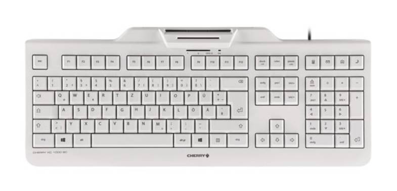 Weiße Vollformat-Computertastatur mit Nummernblock und Medien-/Funktionstasten, von oben auf einfachem Hintergrund gezeigt.