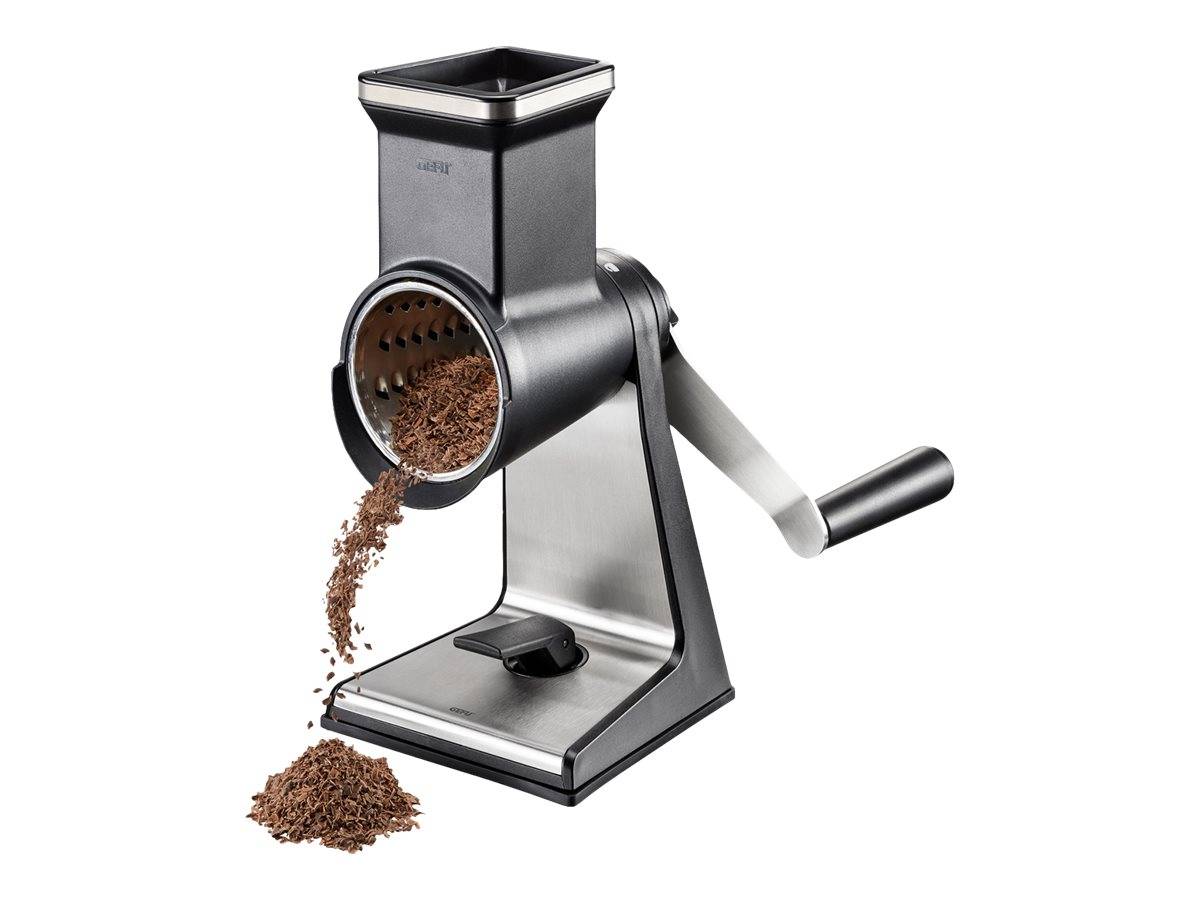 Manuelle Kaffeemühle, die gemahlenen Kaffee in einen kleinen Haufen abgibt, mit einer Kurbel auf der rechten Seite und Bohnen im Behälter.