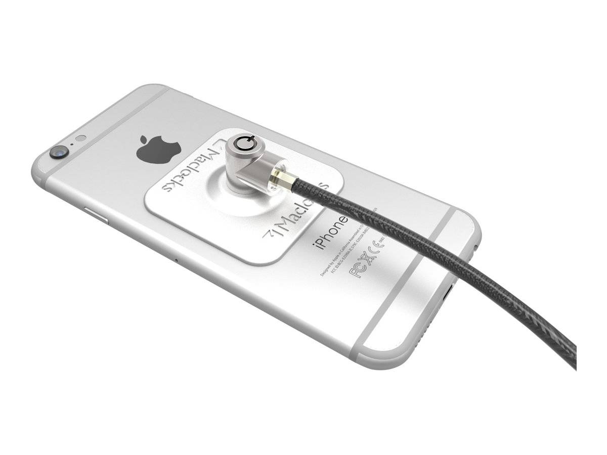 Silbernes iPhone-Rückseite mit einem Kabel, das in ein kreisförmiges Sicherheitsschloss angeschlossen ist, das an einer weißen 