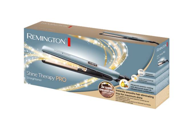 Remington Shine Therapy Pro Haarglätter Karton mit Produktbild, "3X Shine""-Badge und Aussagen über das Glätten von Haaren und die Beseitigung von Frizz für Glanz.