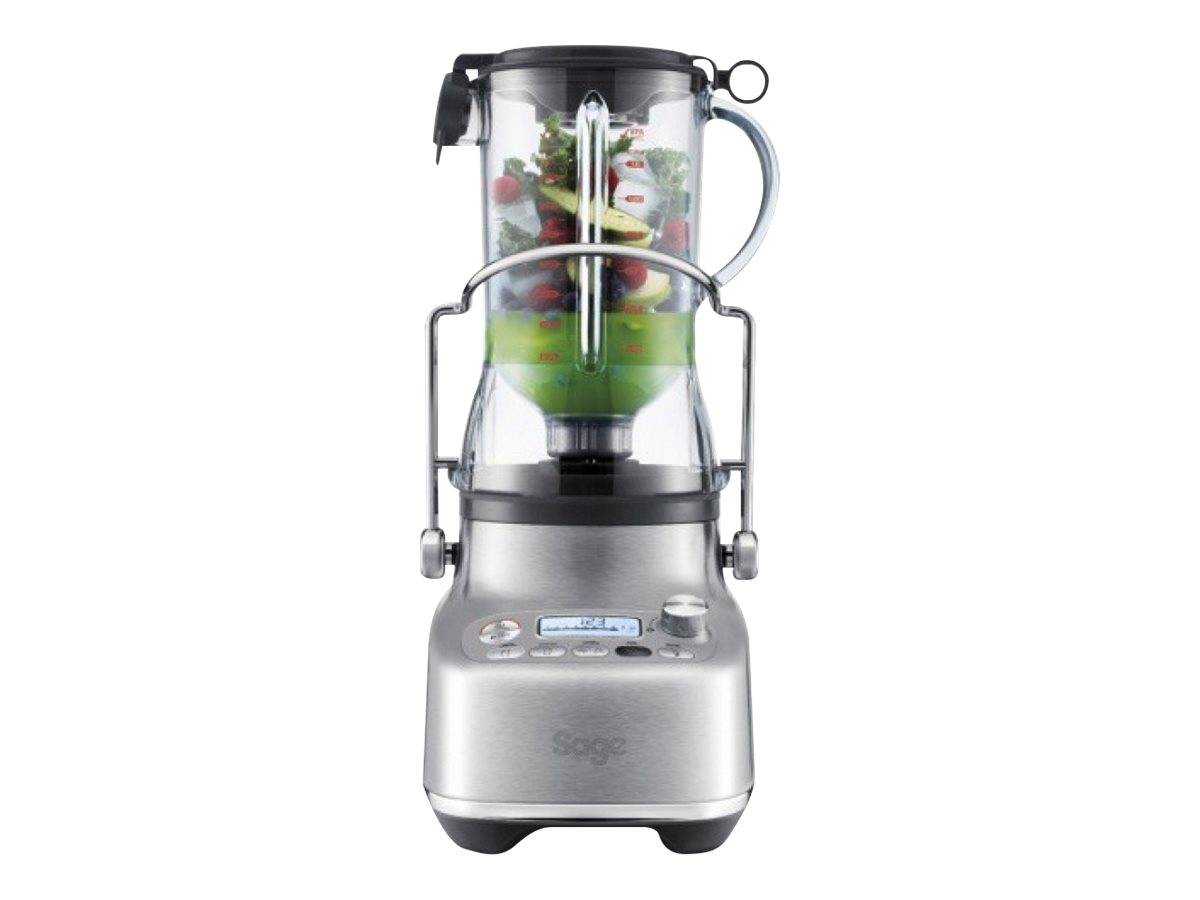 Ein Edelstahlmixer gefüllt mit bunten Früchten und Grünzeug, auf der Küchentheke ausgestellt, bereit zum Mixen.