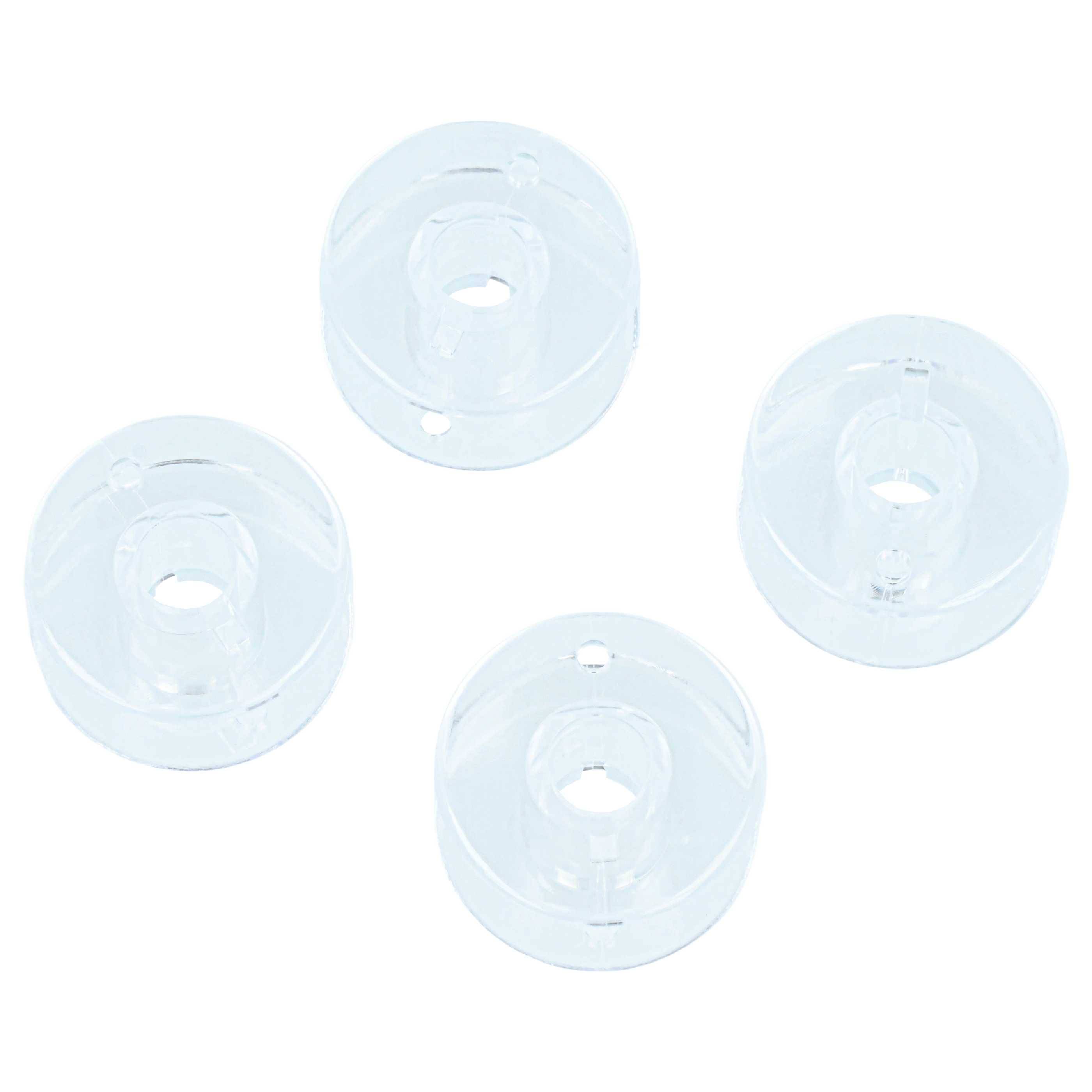 Vier transparente, runde Silikonpolster mit zentralen Löchern, die als Schutzabdeckungen für Möbelbeine verwendet werden, vor einem weißen Hintergrund angeordnet.