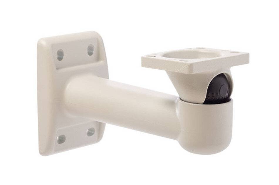 Eine weiße, wandmontierte Halterung mit einem zylindrischen Arm, der von einer quadratischen Basis ausgeht, die für die Befestigung von Sicherheitskameras oder ähnlichen Geräten konzipiert ist.