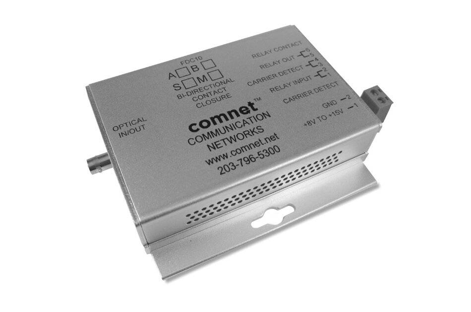 Silver ComNet Kommunikationsnetzwerk-Modul mit beschrifteten Anschlüssen und Statusanzeigen, auf weißem Hintergrund dargestellt.