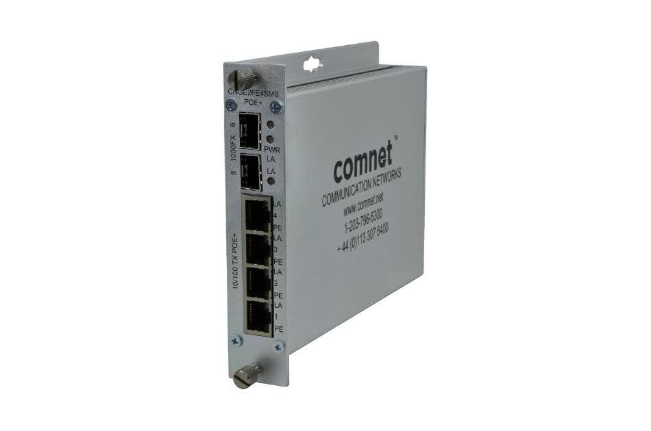 Ein Metall-Netzwerk-Switch von Comnet mit mehreren Ethernet-Ports, gekennzeichnet als 100FX, 1000FX und 10/100 TX POE, der für Kommunikationsnetzwerke verwendet wird.