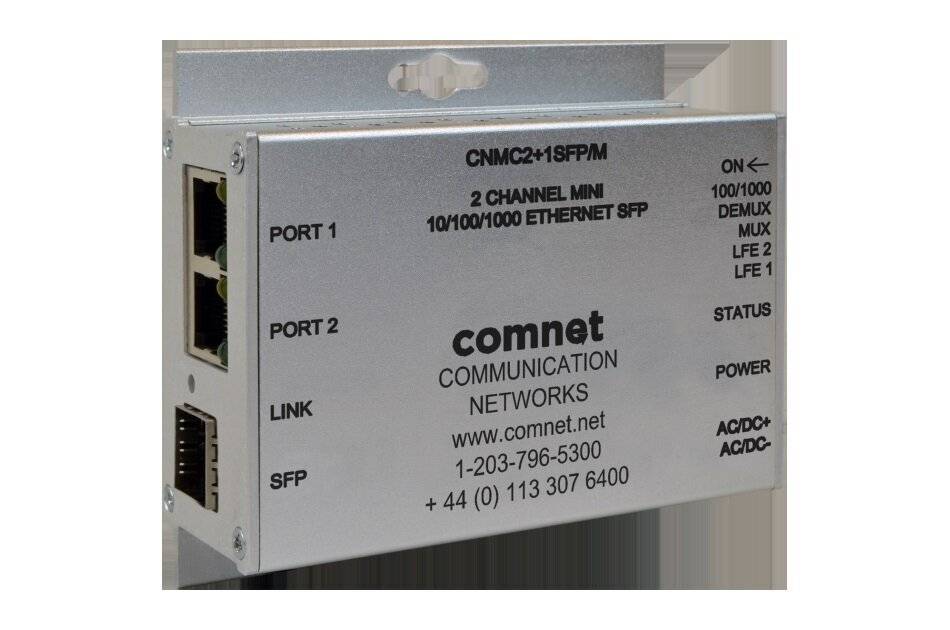 Silberne Kommunikationsvorrichtung mit der Bezeichnung CNMC2+1SFP/M, ausgestattet mit zwei Anschlüssen, Verbindungsstatusanzeigen und Kontaktinformationen für Comnet Networks.