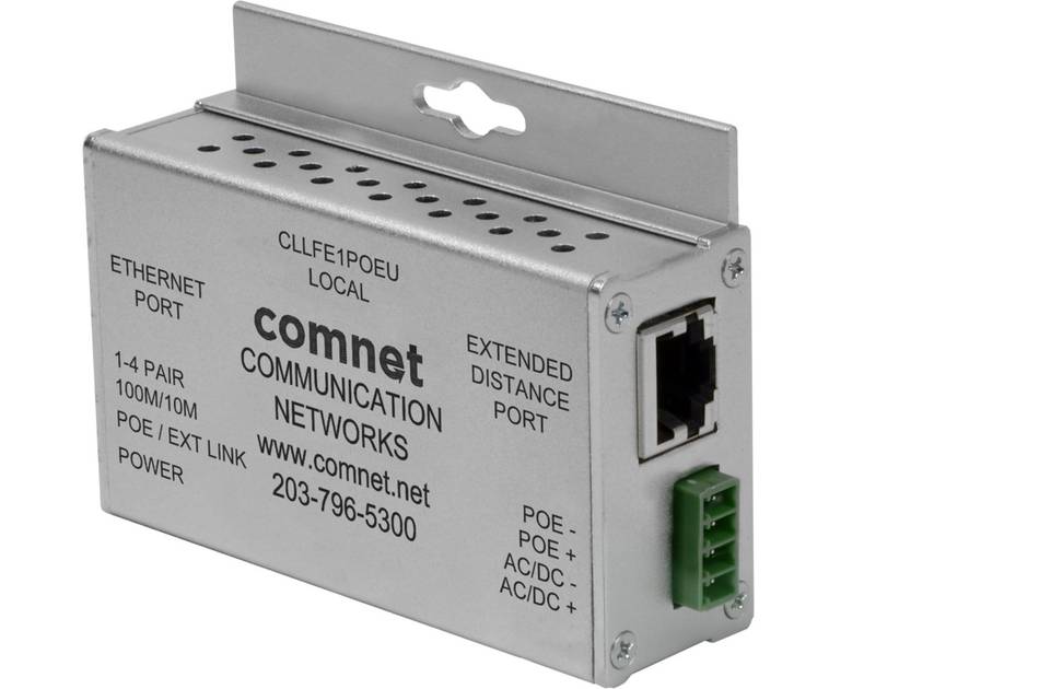 Silber ComNet Kommunikationsnetzwerkgerät mit Ethernet-Anschluss, Fernstreckenport und grünem Stromversorgungsklemmenblock, mit dem Label „comnet