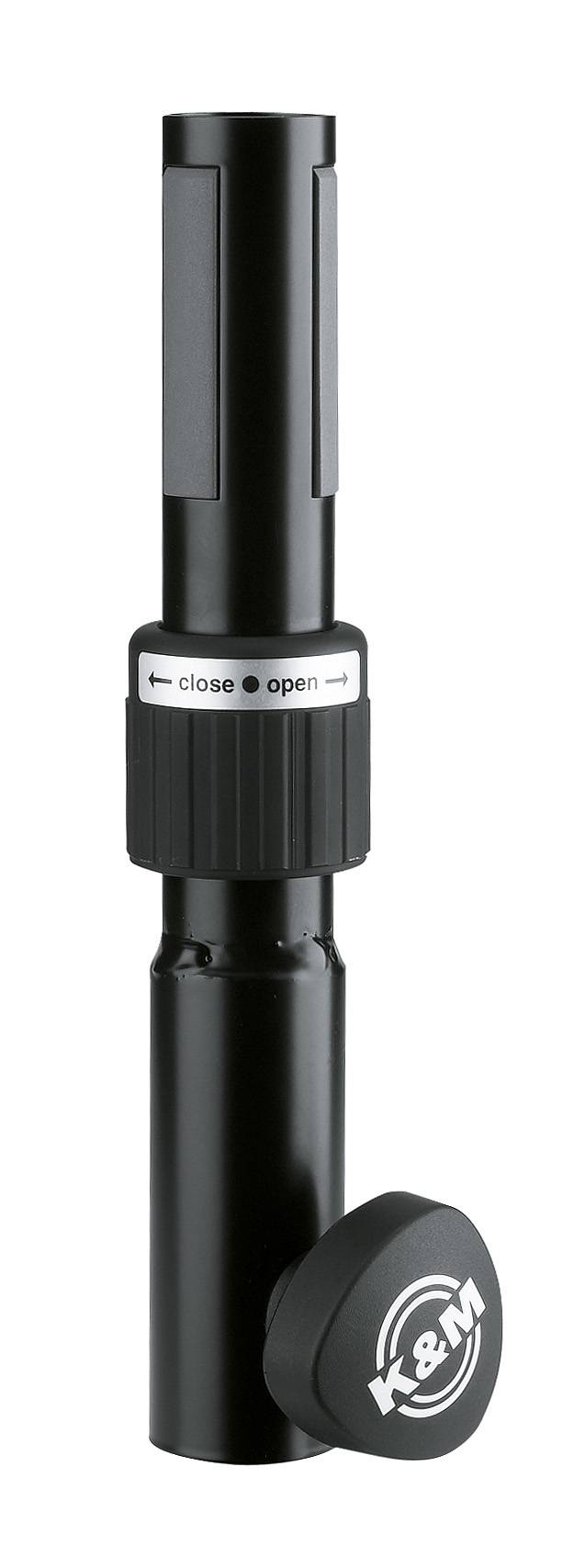 Schwarzes zylindrisches Ventil oder Verbindungsstück mit gerilltem Griff und einer Kappe mit der Aufschrift „close open