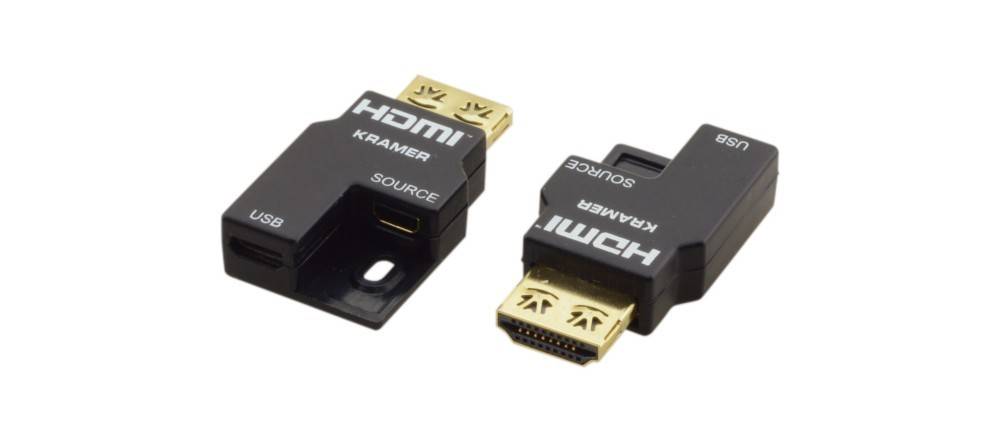 HDMI Kramer-Anschlüsse, auf einem schwarzen Gehäuse mit vergoldeten Enden als 'Quelle' gekennzeichnet, werden zum Verbinden von HDMI-Geräten verwendet.