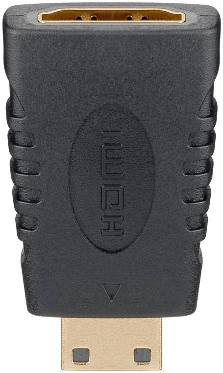 Eine Nahaufnahme eines strukturierten schwarzen Griffes mit vertikalen Rillen und einem ovalen Bereich, der geprägte horizontale Linien enthält, die einem Muster ähneln.